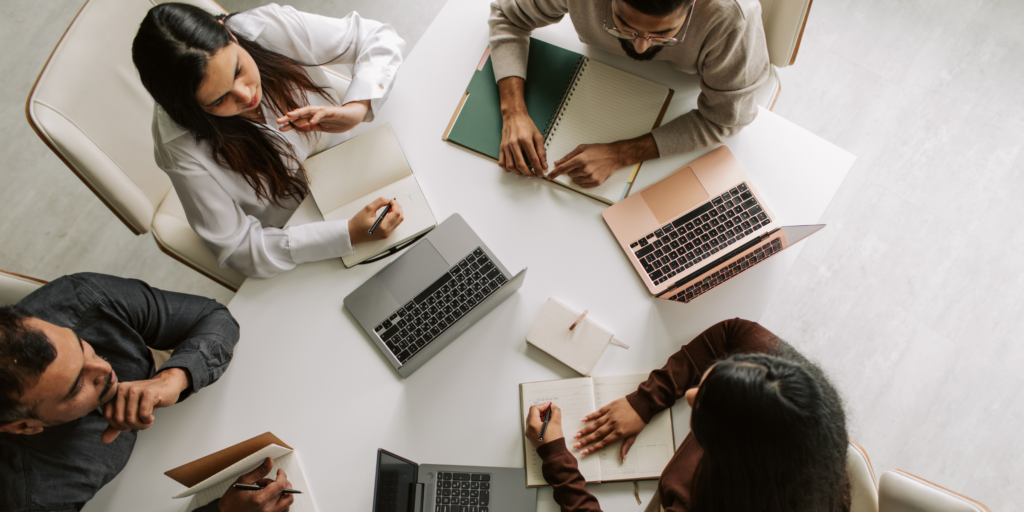 Business analysis professionals team collaborating during the discovery phase of a software development project, analyzing project scope, stakeholder needs, and development roadmap.