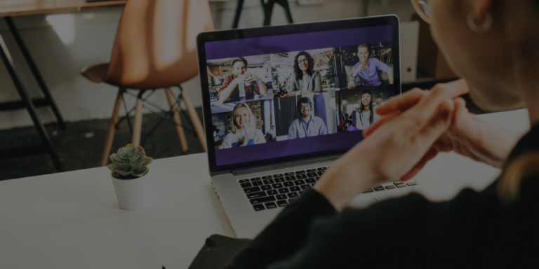 Team members in a virtual meeting on a laptop screen, demonstrating video conferencing, face to face communication online, and effective remote team communication across time zones.